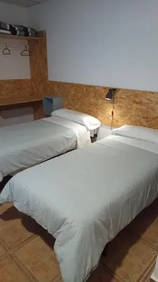 Cama o camas de una habitación en Hostel Elios