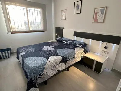Cama o camas de una habitación en Apartamento acogedor a 200m de la playa con jardín comunitario - ES-376-10