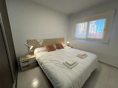 Cama o camas de una habitación en Bonito apartamento en San Juan de los Terreros, piscina comunitaria, cerca de la playa, para 6 pers. - ES-376-8