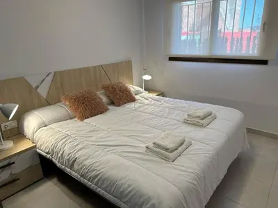 Cama o camas de una habitación en Bonito apartamento en San Juan de los Terreros, piscina comunitaria, cerca de la playa, para 6 pers. - ES-376-8
