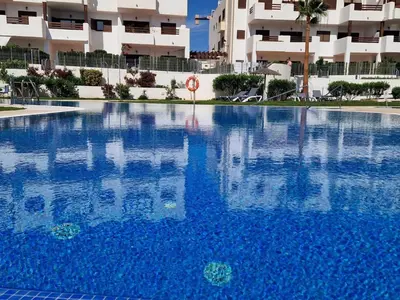 Piscina en o cerca de Apartamento moderno en San Juan de los Terreros, cerca de la playa y piscina - ES-376-1