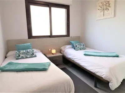 Cama o camas de una habitación en Encantador apartamento con piscina y jardín a 200m de la playa, San Juan de los Terreros - ES-376-20