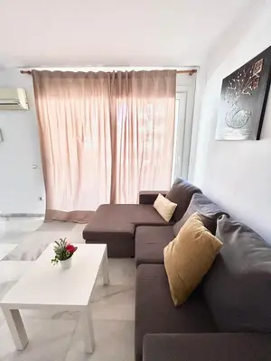 Zona de estar de Expoholidays - Coqueto apartamento Puerto Deportivo