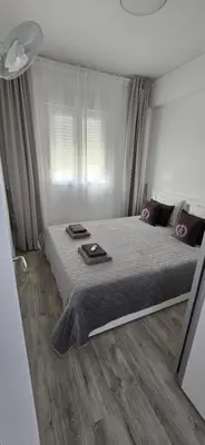 Cama o camas de una habitación en Apartamentos playa Romanilla