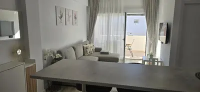 Zona de estar de Apartamentos playa Romanilla
