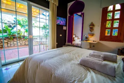 Cama o camas de una habitación en 16:9 Los Molinos Suites