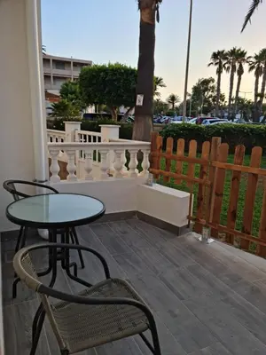 Un balcón o terraza de Vacaciones en Primera Linea de Playa