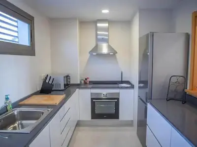 Una cocina o zona de cocina en Apartamento de 2 habitaciones con jardín y piscina comunitaria cerca de la playa en Pulpi - ES-376-24
