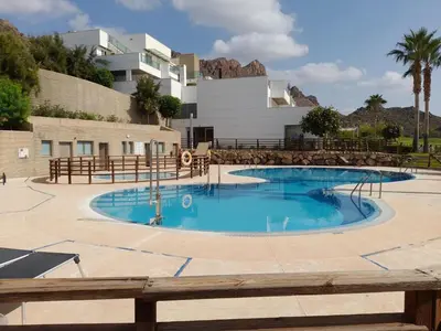 Piscina en o cerca de Apartamento de 2 habitaciones con jardín y piscina comunitaria cerca de la playa en Pulpi - ES-376-24
