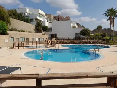 Piscina en o cerca de Apartamento de 2 habitaciones con jardín y piscina comunitaria cerca de la playa en Pulpi - ES-376-24