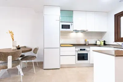 Una cocina o zona de cocina en Cozy & Stylish Stay