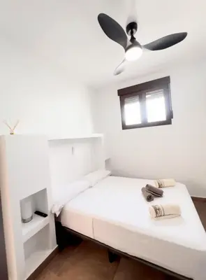 Cama o camas de una habitación en Frente a la ISLA