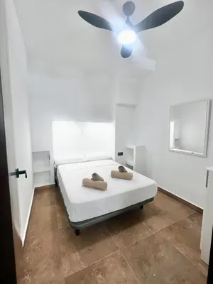 Cama o camas de una habitación en Frente a la ISLA