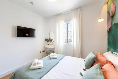 Cama o camas de una habitación en Playa 4min #Parking #Smart TV #2 habitaciones #Familia
