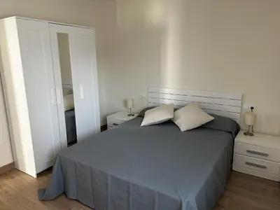 Cama o camas de una habitación en San Pedro Urban Suites