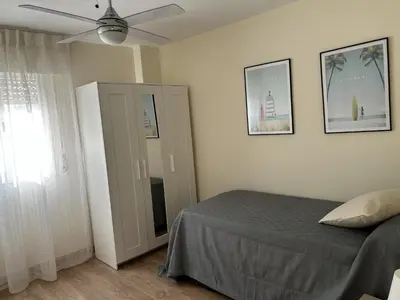 Cama o camas de una habitación en San Pedro Urban Suites