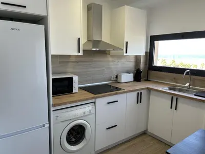 Una cocina o zona de cocina en Marina Playa Apartamento