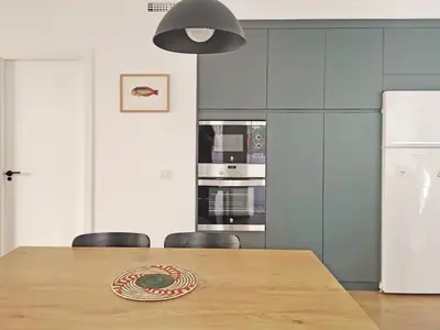 Una cocina o zona de cocina en Almeria Tirso Apartment