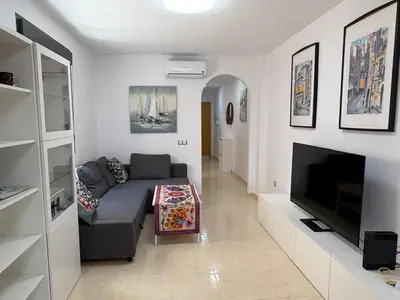 Una televisión o centro de entretenimiento en La Envía Golf Montaña y Playa