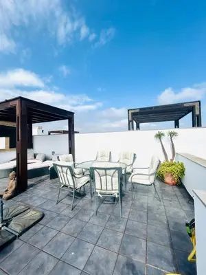Un balcón o terraza de Atico a 10 minutos andando a la playa