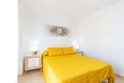 Cama o camas de una habitación en Apartamento en el centro de Águilas - By Aloha Palma