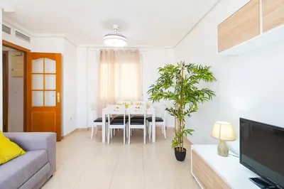Una televisión o centro de entretenimiento en Apartamento en el centro de Águilas - By Aloha Palma