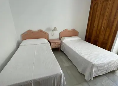 Cama o camas de una habitación en Apartamento en Golf Center Pueblo