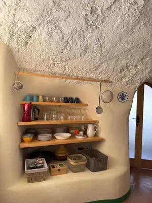 Una cocina o zona de cocina en Bellísima cueva acogedora 