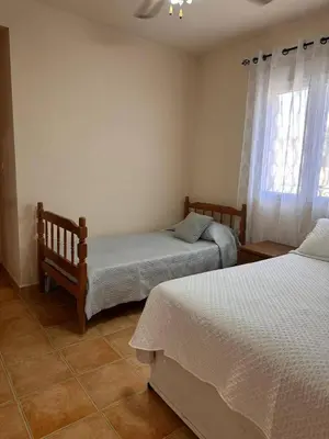 Cama o camas de una habitación en Casa Bueno- Sleeps 7 Private Pool & AirCon