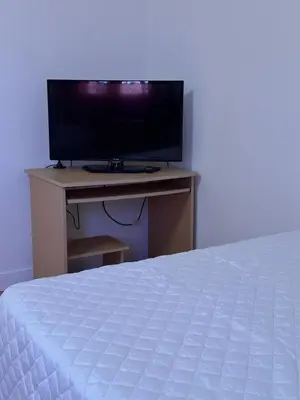 Una televisión o centro de entretenimiento en Casa Bueno- Sleeps 7 Private Pool & AirCon