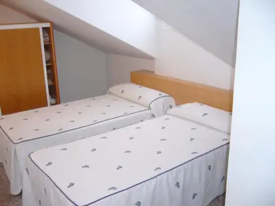 Cama o camas de una habitación en Hostal Casa Grande