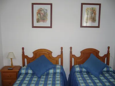 Cama o camas de una habitación en Hostal Casa Grande