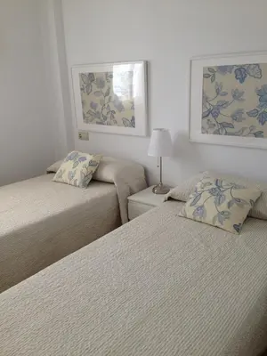 Cama o camas de una habitación en Precioso apartamento con vistas al mar