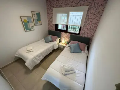 Cama o camas de una habitación en Apartamento encantador en San Juan de los Terreros, acceso a piscina comunitaria, cerca de la playa - ES-376-3