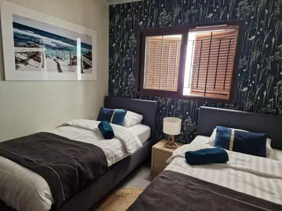 Cama o camas de una habitación en Encantador apartamento en San Juan de los Terreros con jardín y piscina comunitaria - ES-376-21