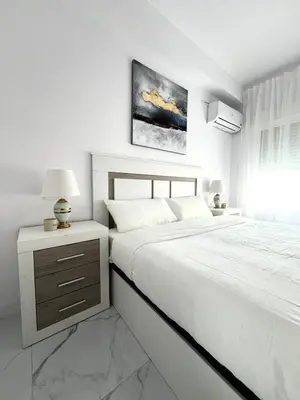 Cama o camas de una habitación en Aguadulce bay apartments 1