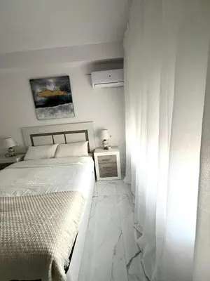 Cama o camas de una habitación en Aguadulce bay apartments 1
