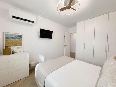 Cama o camas de una habitación en Golf y Playa