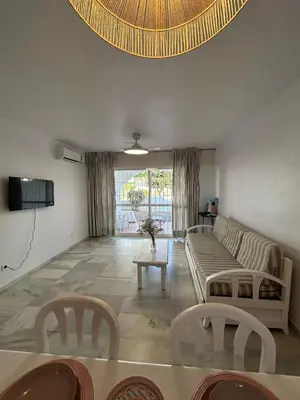 Una televisión o centro de entretenimiento en APARTAMENTO LUXURY Golf Center