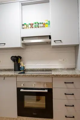 Una cocina o zona de cocina en Apartamento Almerimar primera linea de playa