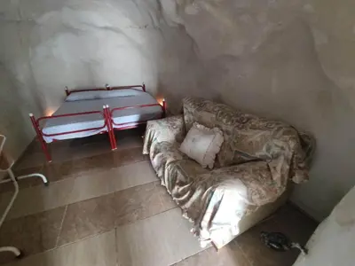 Cama o camas de una habitación en Cueva Rural con Encanto