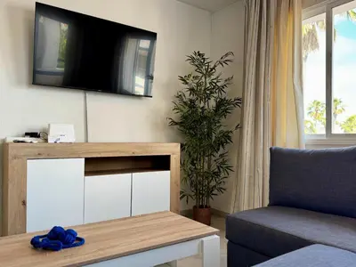 Una televisión o centro de entretenimiento en Apartment in Poblado near Playa Serena