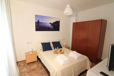 Cama o camas de una habitación en Casa Cándida