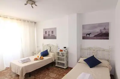 Cama o camas de una habitación en Casa Cándida