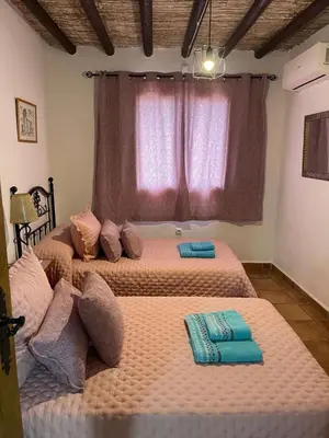Cama o camas de una habitación en Cortijo del Humo