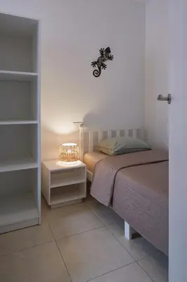 Cama o camas de una habitación en Casa los pececitos