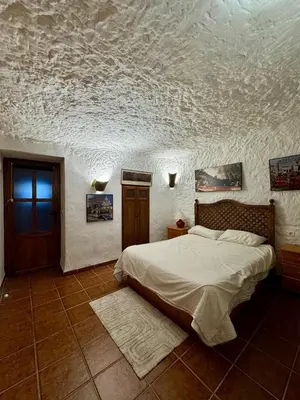 Cama o camas de una habitación en Cueva Solaz Galera