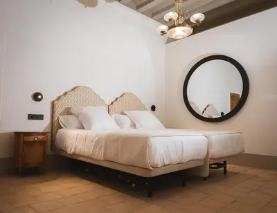 Cama o camas de una habitación en Hotel Boutique Casona de los Rebolledo