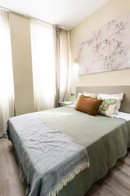 Cama o camas de una habitación en Edificio Almería Gold - City & Sea by Renthas