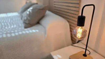 Cama o camas de una habitación en Casa Puerta Roquetas